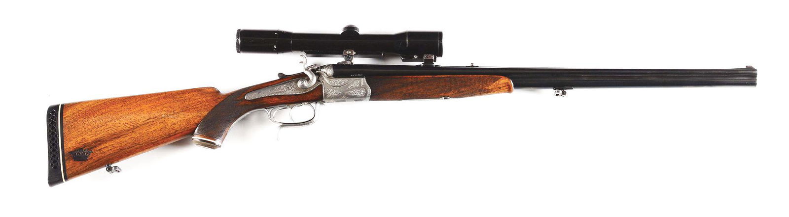 (C) NAGEL AND MENZ DRILLING WITH CARL ZEISS OPTIC.: Pre-War rare external hammer German "Doppelbuchsdrilling" double side by side rifle over shotgun configuration drilling made in Wiesbaden, Germany by Carl Nagel and Gottlieb Menz circa 1920. Blued 24