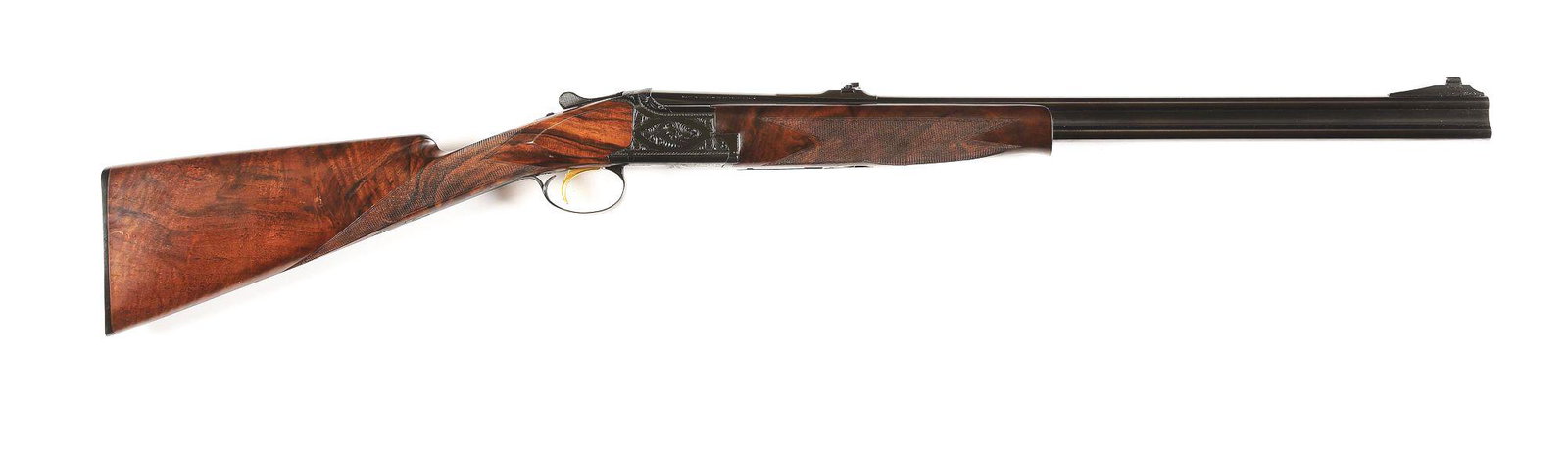(M) BROWNING GRADE I CONTINENTAL .30-06 SUPERPOSED DOUBLE RIFLE.: Made in Belgium by Browning in 1981. Blued 24" over/under round barrels with express sights, ejectors, and Browning maker's marks. Blued Superposed action with light Grade I engraving, gold washed sin