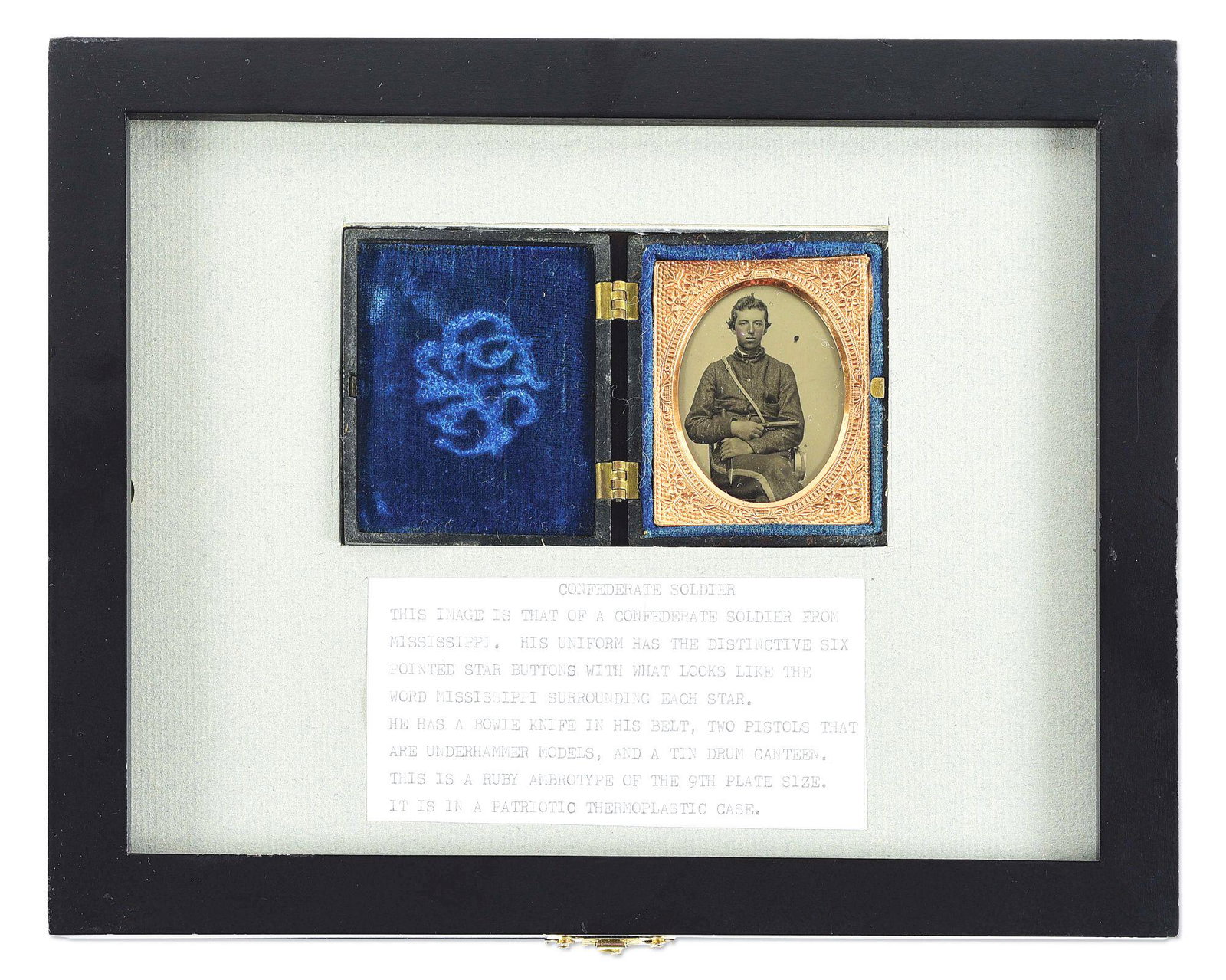 TRIPLE ARMED MISSISSIPPI CONFEDERATE CIVIL WAR 9TH PLATE CASED RUBY AMBROTYPE.: Fantastic and crystal clear cased 9th plate ruby ambrotype image of a young, triple armed, Mississippi Confederate soldier. Under magnification, his uniform has distinctive 6-pointed star buttons with