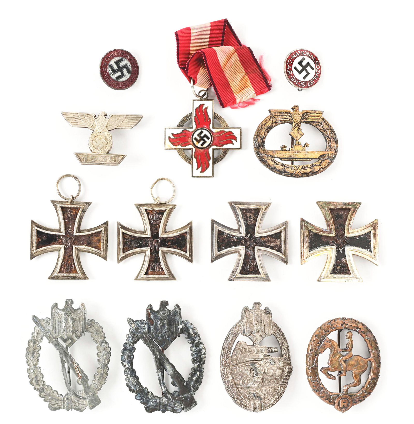 LOT OF 13: GERMAN WWI-WWII BADGES.: Lot consists of: (A) 2 German World War I Iron Crosses with obvious wear. (B) German Riders Badge in bronze marked by Steinhauer & Luck on reverse. (C) German WWII Iron Cross with obscured mark on pin