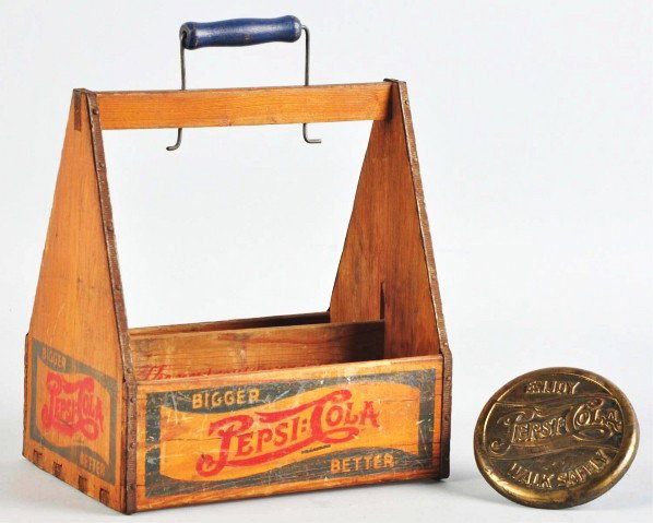 Wooden Pepsi-Cola Carrier & Brass Sidewalk Marker: Description 1940s. Slight darkening, medium overall wear, and only some small dents and minor marks to the sidewalk marker. Condition (Very Good - Excellent). Largest: 9 - 1/4" x 8 - 1/2".