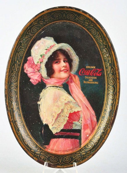 1914 Coca-Cola Tip Tray.: Description Dull overall with some scratches and chips. Border has heavy wear. Condition (Good). Size 6 - 1/4" T.