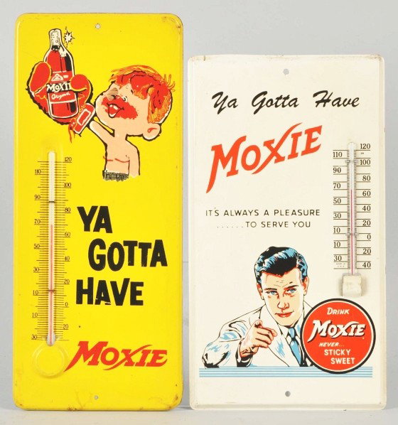 Lot of 2: Tin Small Moxie Thermometers.: Description 1950s to 1960s. Only very light edge wear to the white version and heavier edge wear, minor surface marks, and light soiling to the yellow version. Condition (Excellent). Size Largest: 13 