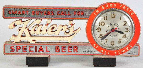 Kaier's Beer Countertop Sign/Clock.: Description Circa 1940s. Laminated cardboard, foil, and wood construction with electric clock inserted in right inset. Good-looking display item with only light soiling or wear. Condition (Excellent P