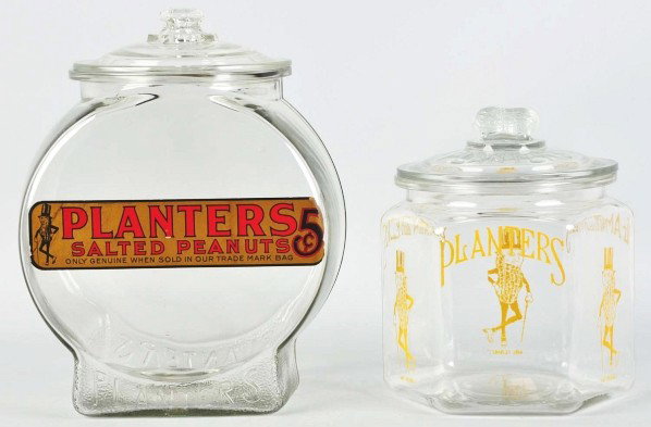 Lot of 2: Planter's Peanuts Jars & Lids.: Description Circa 1950s. The hexagonal jar is clean and bright and the fish bowl has a strong remaining decal. The lid on the fish bowl may not be original and has one small chip to the lip of the bow