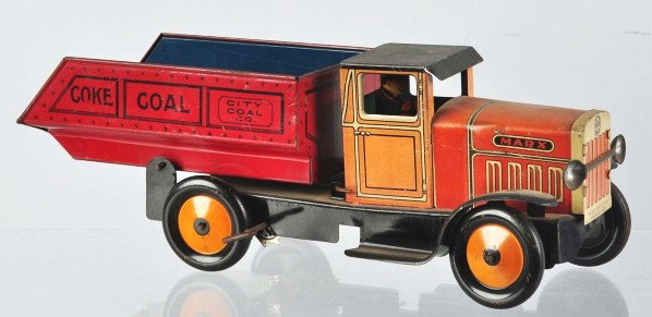 Tin Litho Marx Coal Truck Wind-Up Toy.: Description American. Working. Original driver and headlights. Some fading to the cab and overall scratching and wear. Condition (Good - Very Good). Size 13" L.