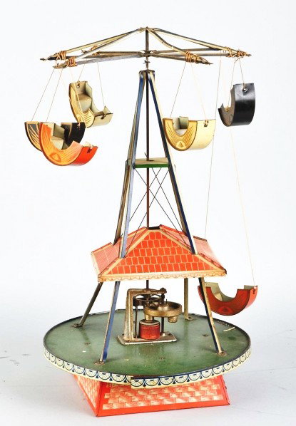 Tin Litho Amusement Park Ride Toy.: Description American. Patent date December 3, 1908. Electrified. Nice lithography. Comes with six matching carts in different colors. Very unusual toy with very little overall wear. Condition (Excelle