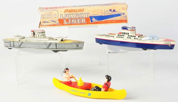 Lot of 3: Boat Toys.: Description American. Includes one Marx friction Luxury Liner with original box, one Marx friction Battleship, and one plastic Ideal Lil' Abner Dogpatch Speshul. Condition (Very Good - Excellent). Siz