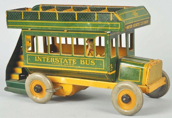 Tin Litho Strauss Interstate Bus Wind-Up Toy.: Description American. Working. Marked "98" on roof. Original lithographed driver. Some scratching and wear throughout. Condition (Very Good). Size 10" L.