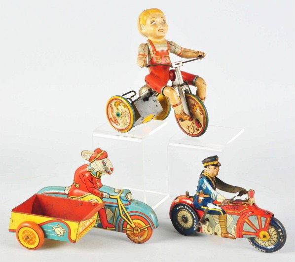 Lot of 3: Tin Litho Vehicle Cycle Toys.: Description American. Includes one wind-up Marx Police Motorcyclist, one Unique Art Kiddie Cyclist, and one Wyandotte Rabbit Cyclist. All have moderate scratching and wear. Condition (Good - Very Good