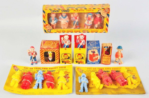 Lot of Plastic Howdy Doody Toys.: Description Includes two Howdy Doody finger puppet sets on original cards (one with staining), one painted number figure set in original box, one Flub-a-Dub talking toy in original box, two Howdy Dood