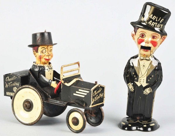 Lot of 2: Tin Marx Charlie McCarthy Wind-Up Toys.: Description American. Working. Includes one Benzine Buggy and one walking toy with movable mouth. Benzine Buggy has loose wheels and some scratching and pitting to hat and tires. Walking toy has minor