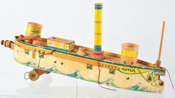 Early Paper on Wood Toy Battleship.: Description Probably made by Reed or Bliss. Marked "Rover" on front. Missing one set of wheels and some other minor parts. Paper has some staining and slight loss. Condition (Good - Very Good). Size 2