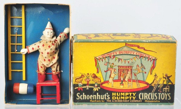 Schoenhut Humpty Dumpty Circus Set.: Description American. Set looks unused, clown, chair, ladder, and barrel are still attached to bottom of box. Includes very colorful original box with some edge wear and creasing. Condition (Excellent