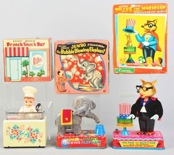 Lot of 3: Tin Litho Battery-Operated Toys.: Description Japanese. Working. Includes one scarce Brunch Snack Bar, one Bubble Blowing Elephant, and one Mr. Fox the Magician. Some staining to fur on the elephant. Includes all original boxes with s