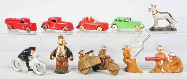 Lot of 10: Misc. Diecast & Cast Iron Toy Items.: Description Includes Hubley Wimpy paperweight, several slush mold and Barclay vehicles and soldiers, and one dog paperweight. Various conditions. Condition (Very Good). Size Largest: 3 - 3/4" T.