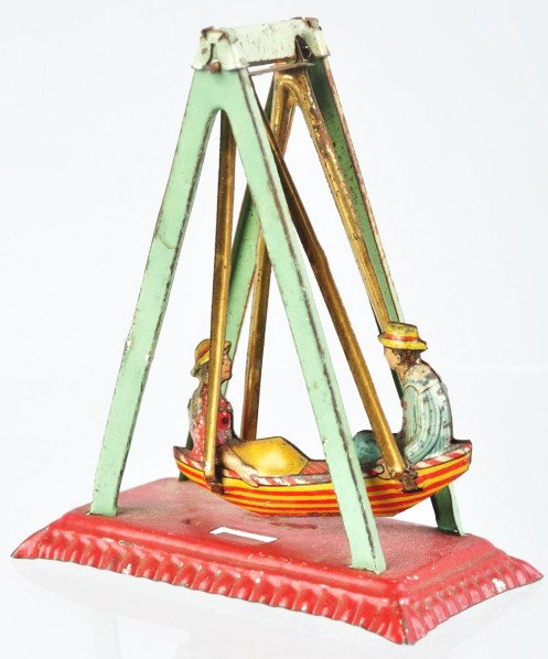 Tin Litho Swing Penny Toy.: Description German. Depicts lithographed man and woman in boat swing. Some scratching and wear overall. Condition (Very Good). Size 3 - 1/4" T.