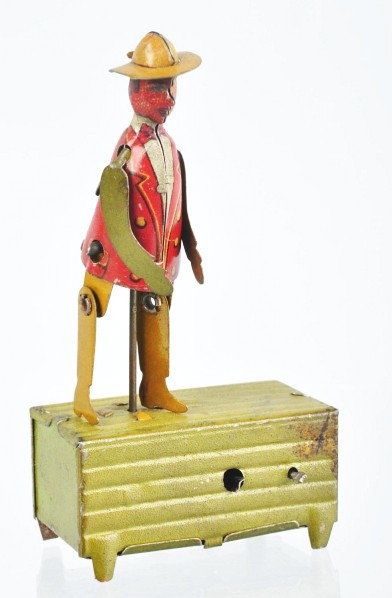 Tin Litho Alabama Roof Dancer Penny Toy.: Description German. Crank-operated. Marked "Germany" on back of figure. All original. Some wear to base. Condition (Very Good - Excellent). Size 4" T.