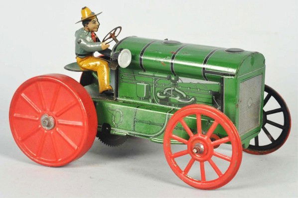 Tin Litho Tractor Wind-Up Toy.: Description German. Working. Unusual toy made by Guntherman. Original separate tin litho rider. Minor wear to wheels. Condition (Very Good - Excellent). Size 7 - 1/2" L.