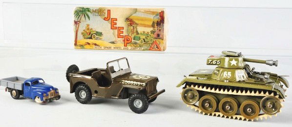 Lot of 3: Tin Litho Vehicle Wind-Up Toys.: Description European. Working. Includes one Minic Military Jeep with original box, one Gama US Zone Germany tank, and one small Schuco no. 3042 dump truck. Condition (Very Good). Size Largest: 6" L.