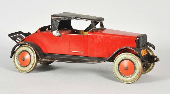 Pressed Steel Chein Roadster Automobile Toy.: Description American. Fold-down rumble seat and front license plate. Wheels marked "Hercules Balloon Cord.". Some wear throughout. Condition (Very Good). Size 18 - 1/2" L.