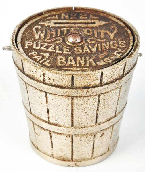 Cast Iron White City Bucket Still Bank.: Description Some minor damage. Condition (Very Good). Size 2 - 3/4" T.