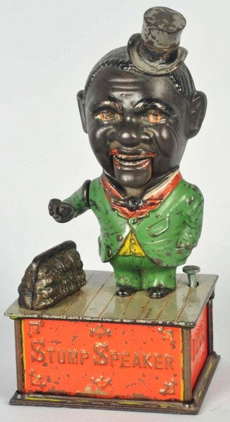 Cast Iron Stump Speaker Mechanical Bank.: Description Manufactured by Shepard Hardware Co. Brown face variation. Working condition. Condition (Excellent). Size 10" T. CORRECTION: Base is repaired, and the trap is replaced.