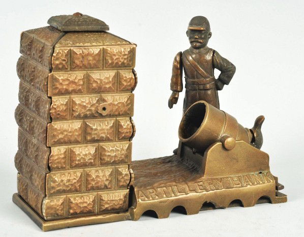 Cast Iron Artillery Pattern Mechanical Bank.: Description Manufactured by J. & E. Stevens and Company. Designed by Peter Adams, circa 1900. The coin is placed in the cannon (or mortar). The hammer is then pushed back; when the thumb-piece is pres