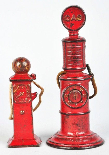Lot of 2: Cast Iron Arcade Gas Pumps.: Description American. Both with original hoses. Some paint loss and wear. Condition (Very Good). Size Largest: 6 - 3/4" T.