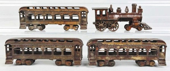 Cast Iron Passenger Train Set.: Description American. Includes no. 178 steam engine and three Lake Shore and Michigan Southern passenger cars. Some wear and paint work. Condition (Very Good). Size Engine: 8 - 3/4" L.