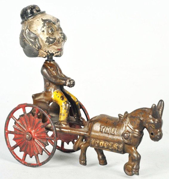 Cast Iron Kenton Foxy Grandpa Nodder Cart Toy.: Description American. Marked "The Nodders" on side of donkey pulling cart. Foxy Grandpa's head bobs back and forth. Some chipping and paint loss throughout. Condition (Very Good). Size 6 - 1/4" L.