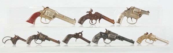 Lot of 8: Vintage Cast Iron Toy Pistols.: Description Includes one Magic, one Scout, one Invincible, and others. Various conditions. Condition (Good - Very Good). Size Largest: 8" L.