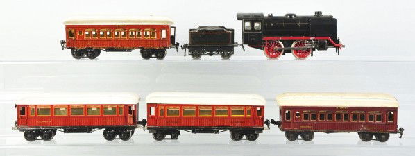 Marklin 1-Gauge Passenger Train Set.: Description German. Includes no. R921 engine with matching tender and four Mitropa passenger cars. Passenger cars include two Speiswagens and two Schlafwagens. This is not a matching set. Some minor s