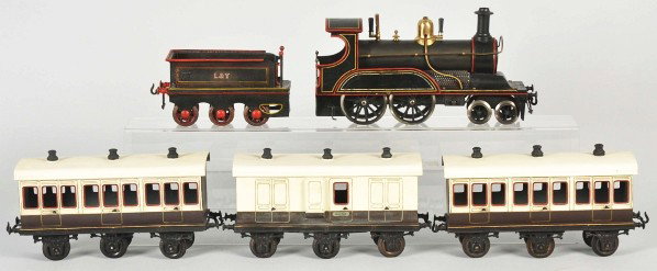 German 1-Gauge Passenger Train Set.: Description Pre-war. Includes live steam engine and L&Y tender, engine is missing its steam plant. Also includes three passenger cars with knobs on roofs. The entire set has been professionally restor