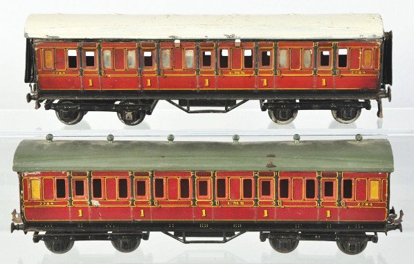 Lot of 2: Carette 1-Gauge Passenger Train Cars.: Description German. Both marked "LMS 2784". Roofs are different but cars are still matching. One roof has been repainted and the other roof has some denting. Some scratching and wear overall. Conditio