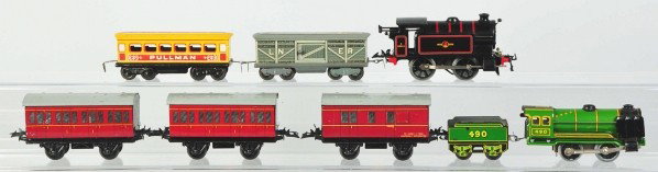 Lot of 2: Tin Litho Hornby O-Gauge Train Sets.: Description English. Includes no. 490 engine and no. 490 tender with one boxcar and one engine with three passenger cars. Some scratching and wear overall. Condition (Very Good).