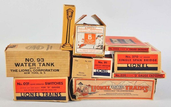 Lot of Lionel & Marx Train Accessories.: Description American. Includes no. 270 o-gauge bridge, no. 93 water tank, one set of standard gauge switches, one crossover, one Marx signal, no. 129 hand-operated switches, some small barrels, and ot