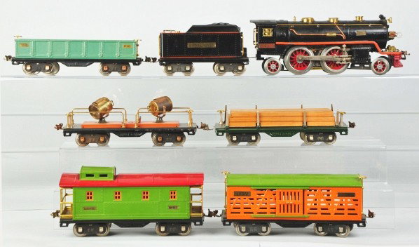 Lionel Standard Gauge No. 390E Freight Train Set.: Description Includes no. 390E engine with orange stripe, no. 390T tender, no. 512 gondola car, no. 520 searchlight car, no. 513 cattle car, no. 511 lumber car, and no. 517 caboose. Frame has slight wa