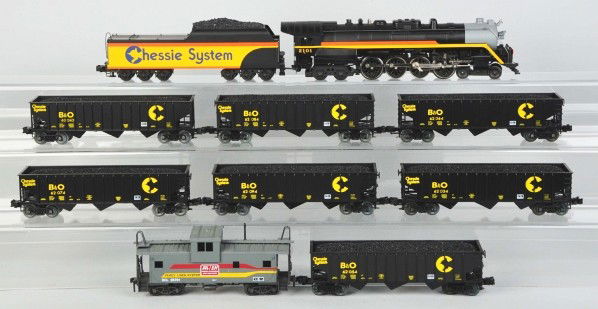 Lionel Chessie Freight Train Set.: Description Contemporary. O-27 coal train set includes Chessie no. 20101 steam locomotive and tender with seven coal cars, all marked "62084 Chessie", and matching caboose. Engine is nicely done with