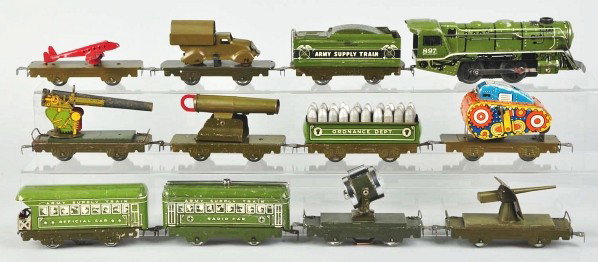 Marx O-Gauge Army Supply Electric Train Set.: Description Pre-war. Includes no. 897 steam-type locomotive with Army Supply train tender, radio car, flat car with truck, flat car with cannon, flat car with Howitzer, flat car with artillery gun, fl