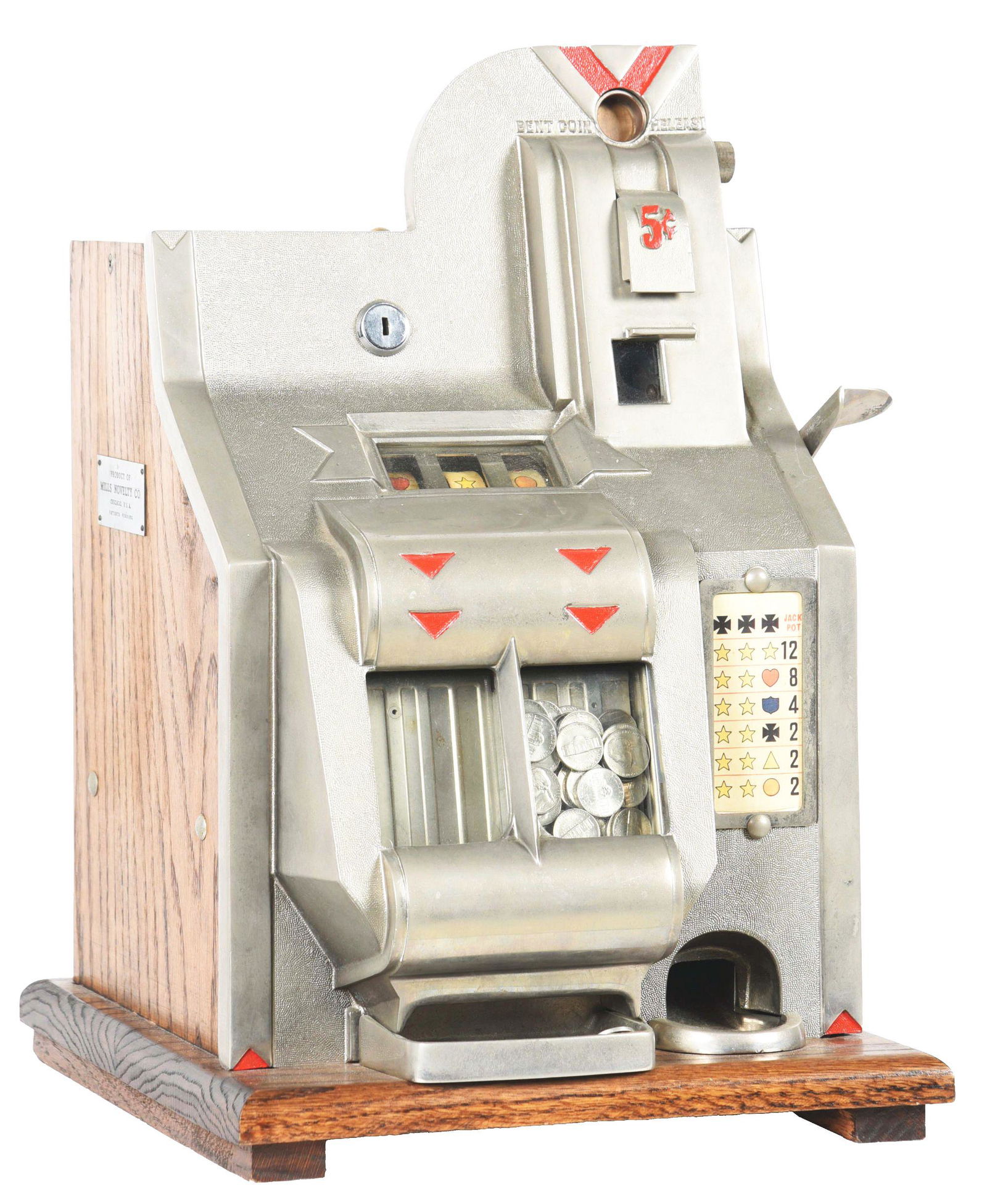 5¢ MILLS CHEVRON QT SLOT MACHINE.: Manufactured by Mills in 1936, featuring a small die-cast aluminum front, with silver paint and red details. There is a double jackpot reserve, with original reel strips and back door with original aw