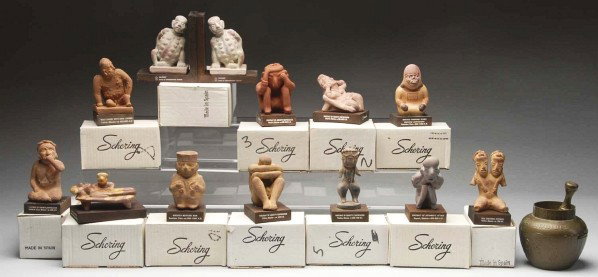 Lot of 12: Schering Figures & 1 Maimonides Radio.: Description Mid-20th Century Schering Corporation advertising pieces. Complete set of 11 Pre-Colombian Figures depicting various medical conditions; unused in original boxes. Scarce 1968 plastic radio