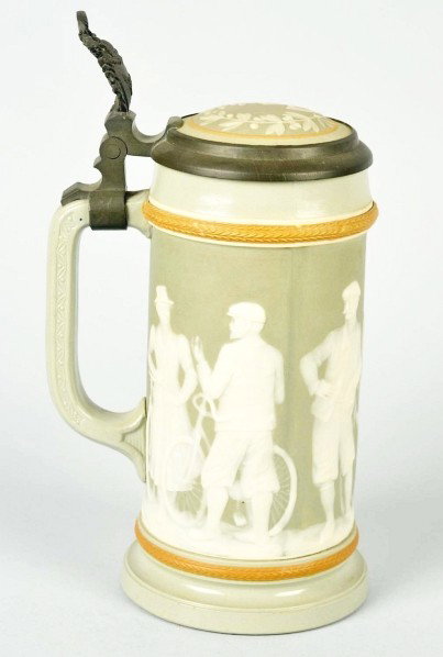 Mettlach 0.5 Liter Stein No. 2627.: Description All original. Inlaid lid. Wedgewood cameo style. Depicts people with bicycles. No damage. Condition (Excellent). Size 9" T.