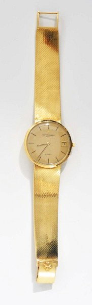 18K Mens Attached Band Wrist Watch.: Description 1980s. Swiss-made Vacheron and Constantin Automatic. 36 jewel. Reference # 7416. A few small marks on dial. Date at 3 o'clock. Serial # 503993. Condition (Excellent).