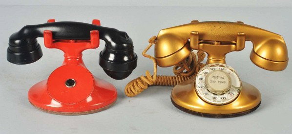 Lot of 2: Western Electric 202 Cradle Telephones.: Description Circa 1935. First is a red painted 202 with a push button instead of a dial and a black E1, no cords. Second is a gold painted 202 with a #6 dial, F1 handset with some loss of paint. Condi