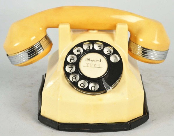 Automatic Electric Ivory 34 Cradle Telephone.: Description A project phone. Chrome banded handset is darker than shell, no cords, base gasket has hardened and cracked, repair around the plunger, 3/16" holes on the outside of the cradle have been f