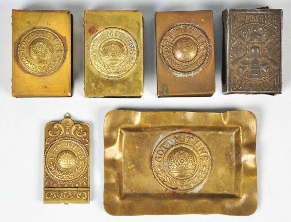 Lot of 6: German Nazi Military Tobacco Items.: Description World War I tobacco items. Includes four match safes, one ashtray and one money clip. All marked "Gott Mit Uns". Condition (Very Good). Size Largest: 4 - 1/2" L.