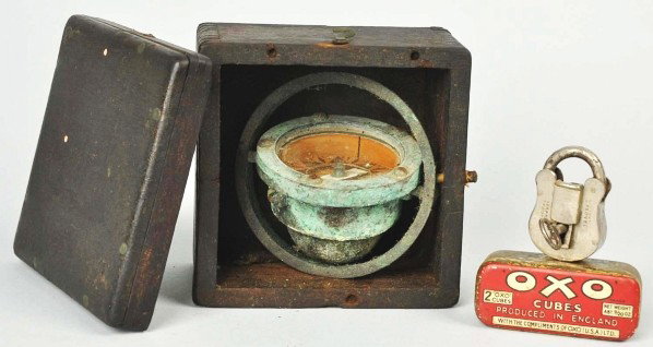 Lot of 3: Compass, Lock with Key, & Tin OXO Box.: Description Metal compass comes with a wooden box. Condition (Very Good). Size Largest: 3 - 1/2" T.