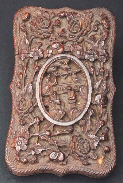 Victorian Calling Card Case.: Description Highly carved wood with floral and Oriental scene. One very small piece (1/8") of wood missing from right bottom. Condition (Excellent). Size 4 - 1/4" T.