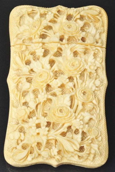 Victorian Calling Card Case.: Description Highly carved ivory with Oriental scene on one side and floral open lattice work on the other side. Condition (Excellent). Size 4 - 1/4" T.